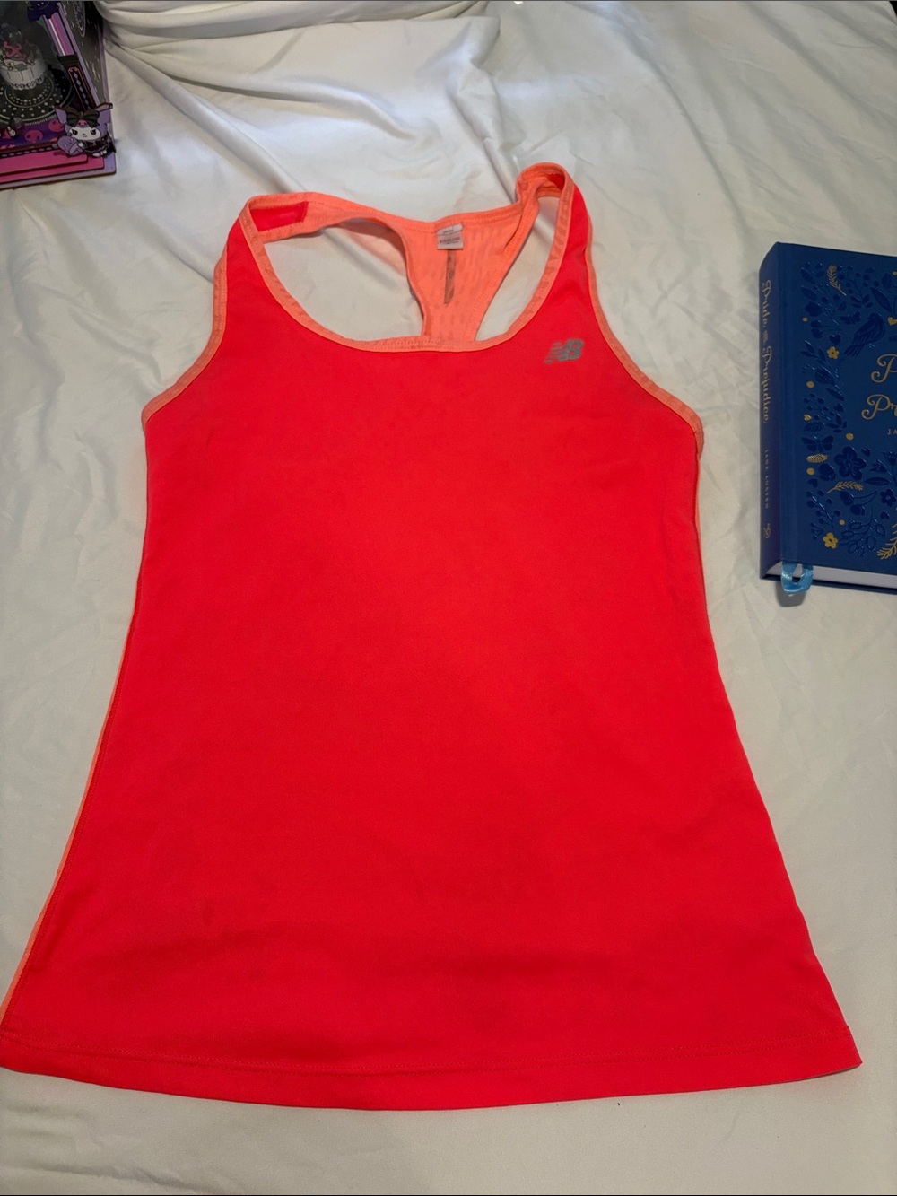 New Balance Women’s Neon Coral Racerback Performance Tank